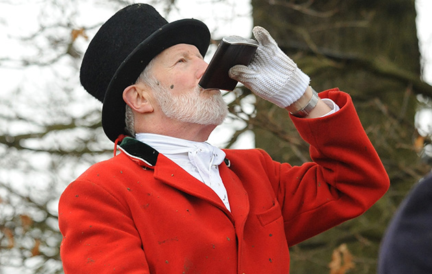 A Huntsman Drinking Whisky from a Hip Flask